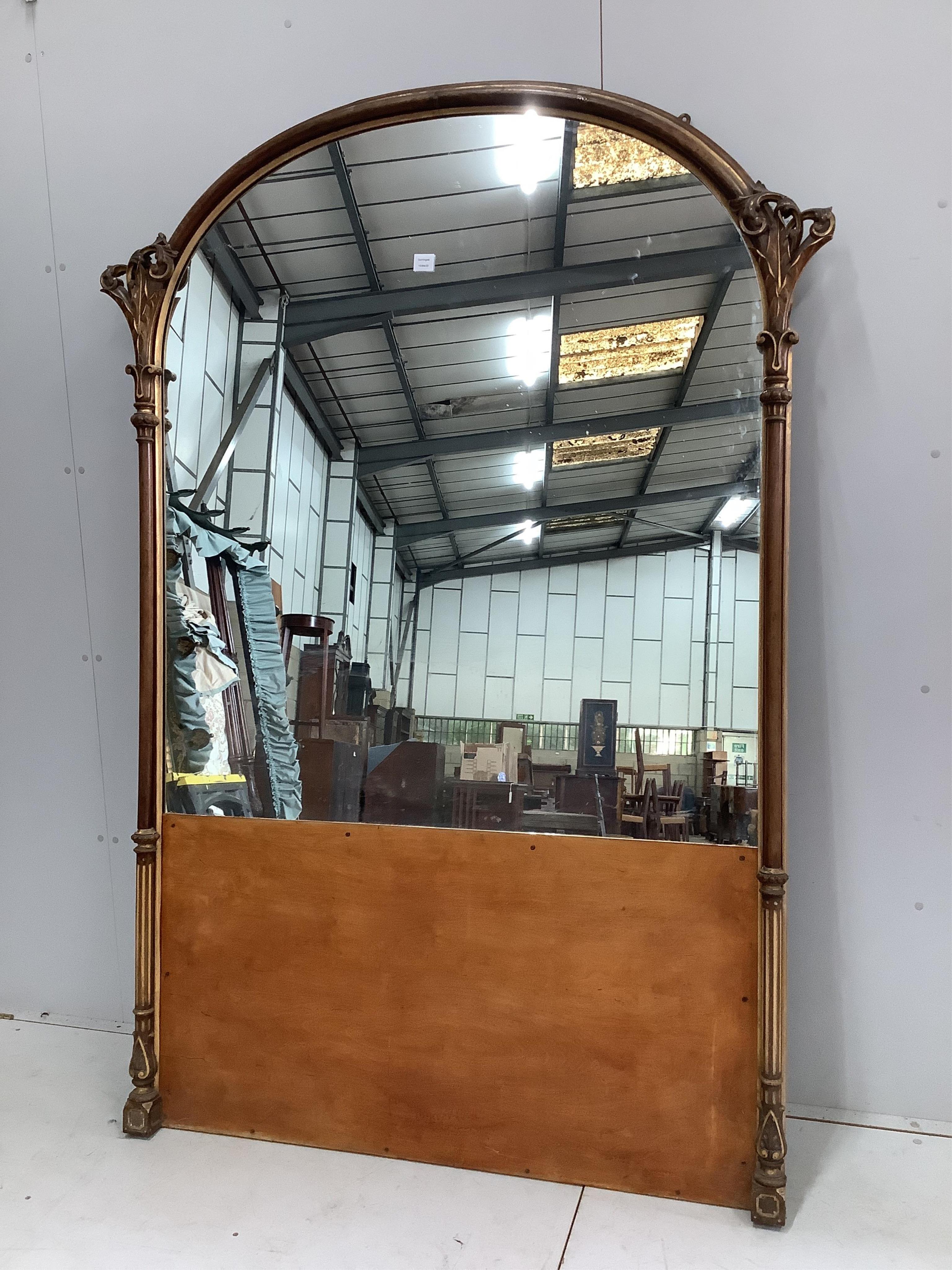 A Victorian parcel-gilt mahogany overmantel mirror, with partial plate, width 146cm, height 206cm. Condition - fair